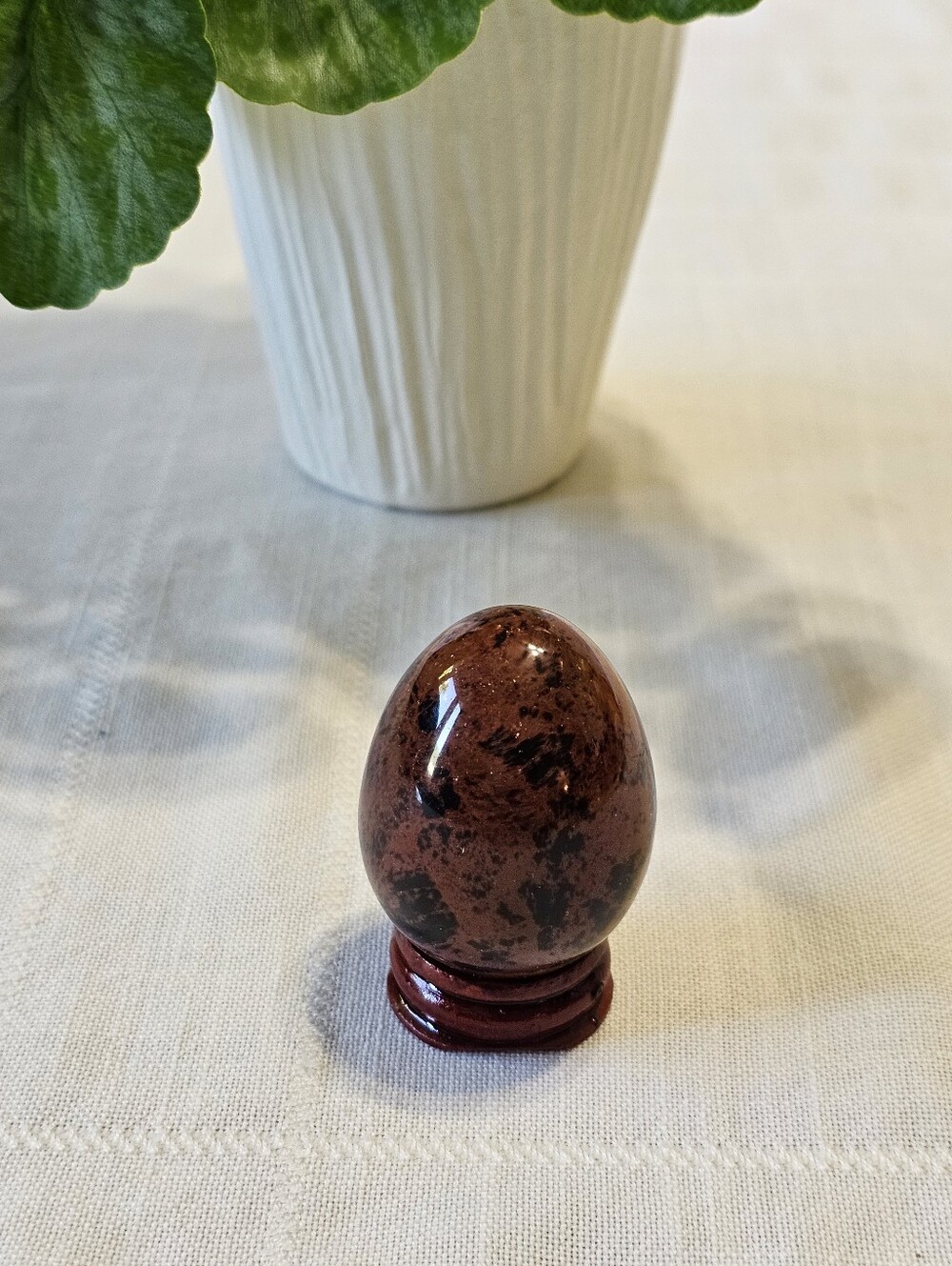 Polished Mahogany Obsidian Crystal Egg on Wooden Stand